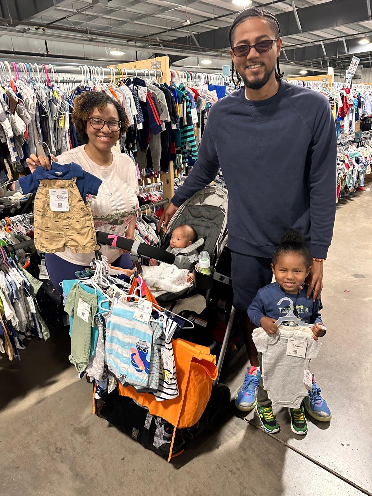 Young family with newborn in stroller